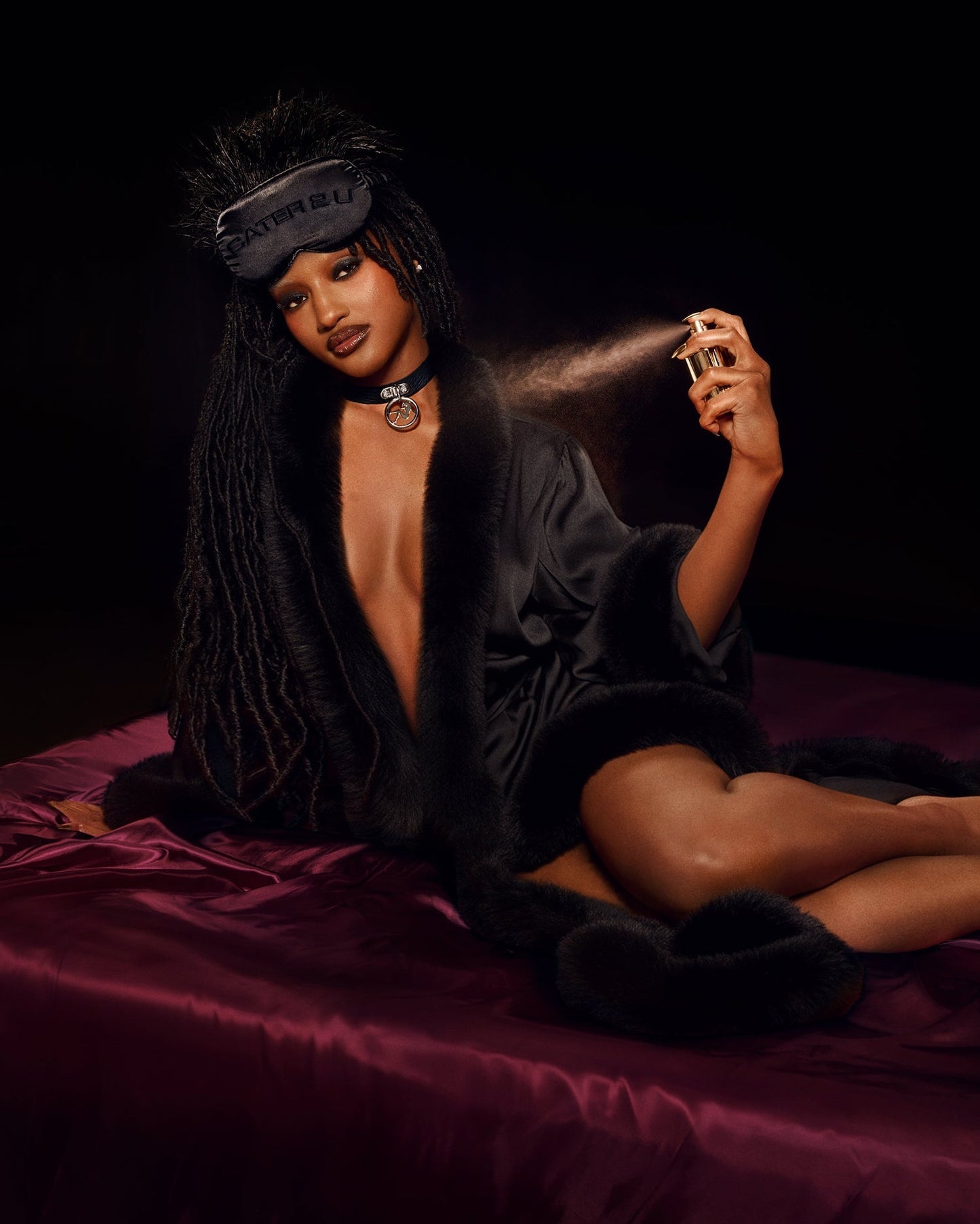 Black Beyoncé merch Renaissance satin robe lifestyle view with plush trim and luxe satin styling
